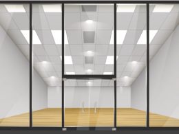 Shop with glass windows and doors, front view.